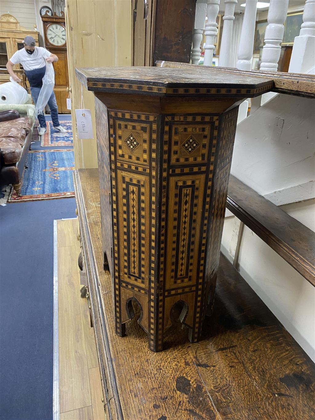 A Moorish octagonal mother of pearl inlaid work table, width 50cm, depth 33cm, height 56cm